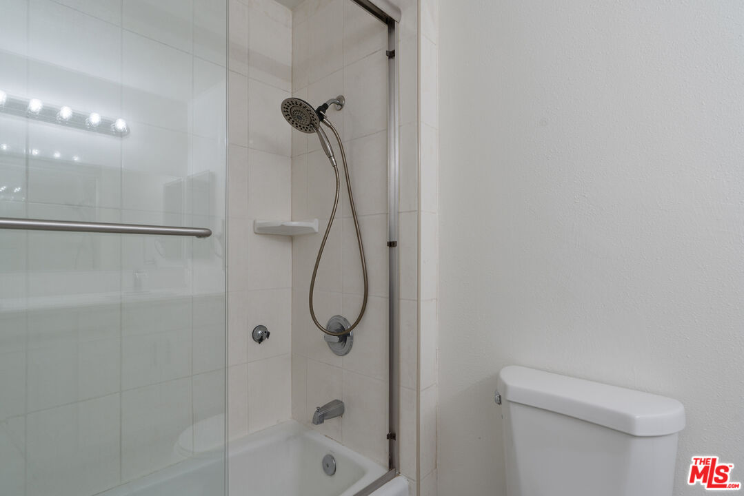 46 Eagle Point Irvine, CA 92604 - Photo 22 of 30 a bathroom with a shower and a toilet