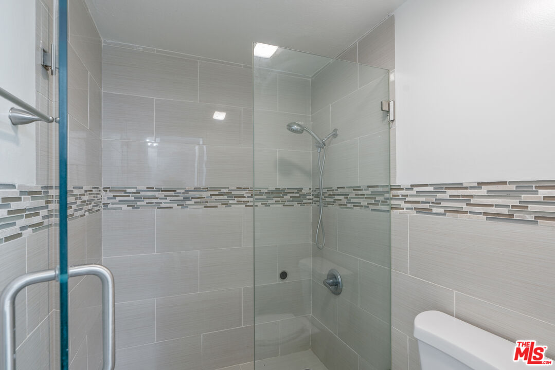46 Eagle Point Irvine, CA 92604 - Photo 27 of 30 a bathroom with a shower