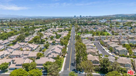 an aerial view of a city with lots of residential buildings