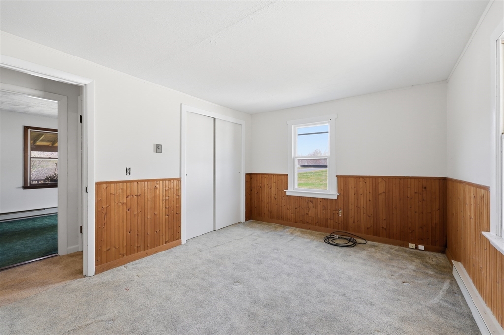 240 Upper Road Deerfield, MA 01342 - Photo 27 of 42 an empty room with windows and closet
