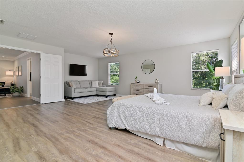 701 Kettering Road Davenport, FL 33897 - Photo 18 of 41 a bedroom with a bed and window