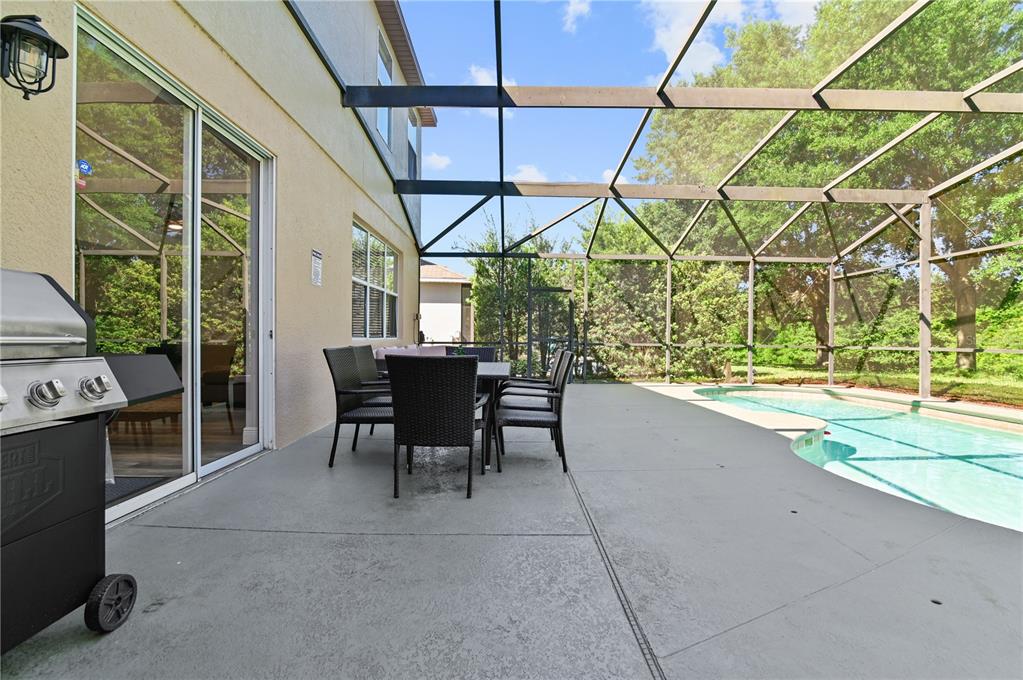701 Kettering Road Davenport, FL 33897 - Photo 31 of 41 a dining room with furniture and a window