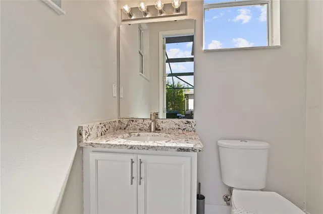 a bathroom with a sink and a toilet