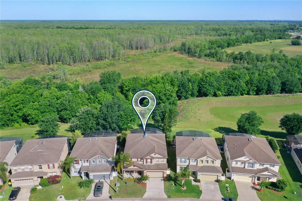 701 Kettering Road Davenport, FL 33897 - Photo 38 of 41 an aerial view of a house with pool