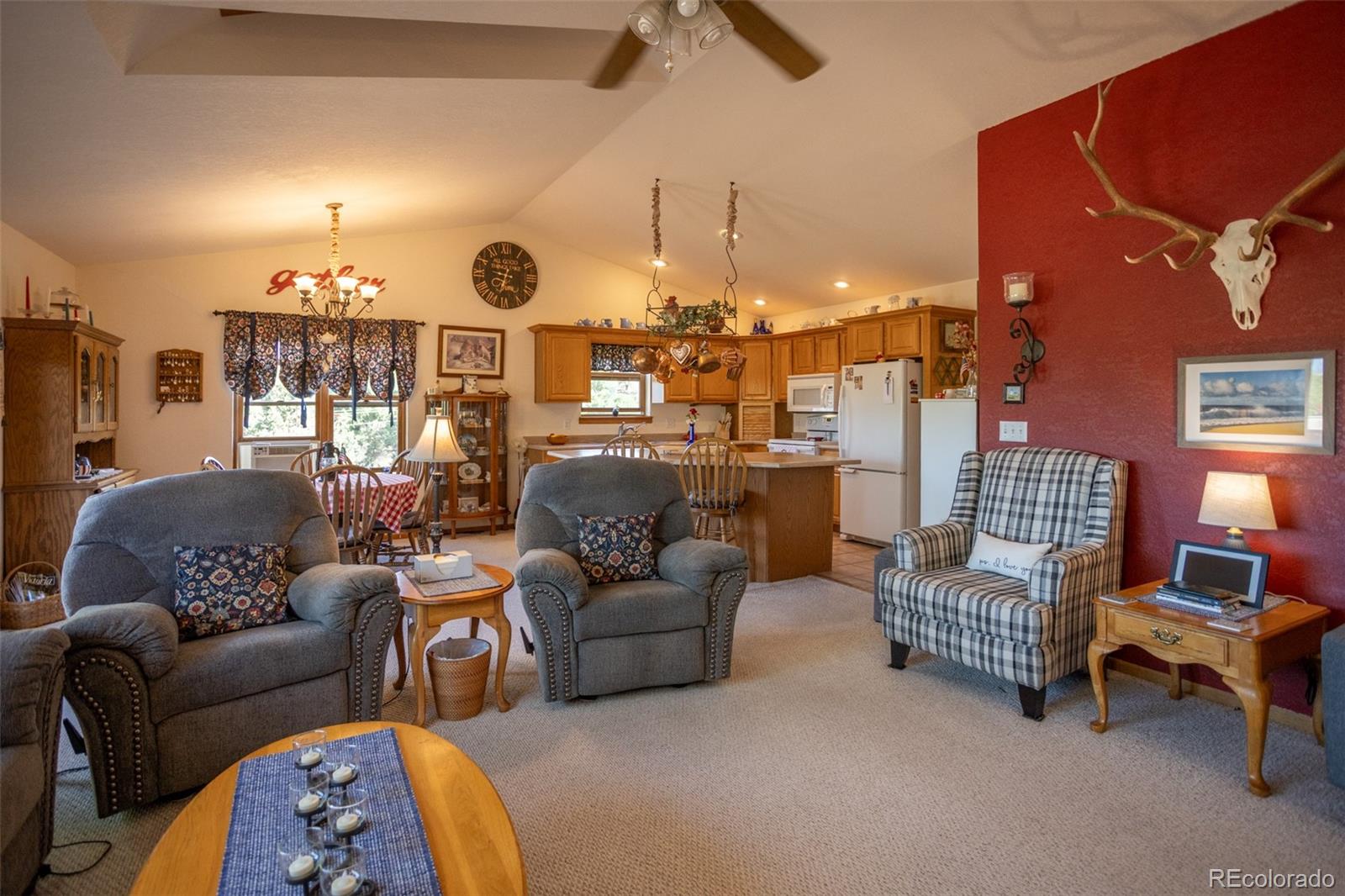 7280 County Road 178 Salida, CO 81201 - Photo 17 of 39 a living room with furniture and a chandelier