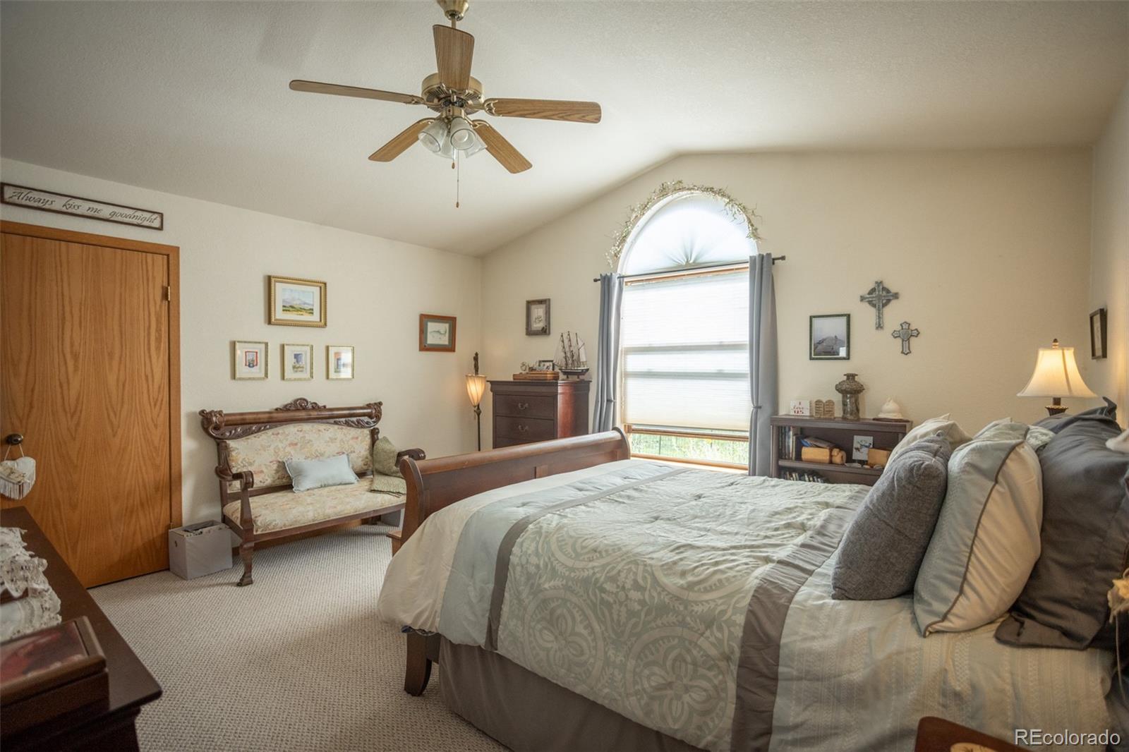 7280 County Road 178 Salida, CO 81201 - Photo 25 of 39 a bedroom with a bed couch and window