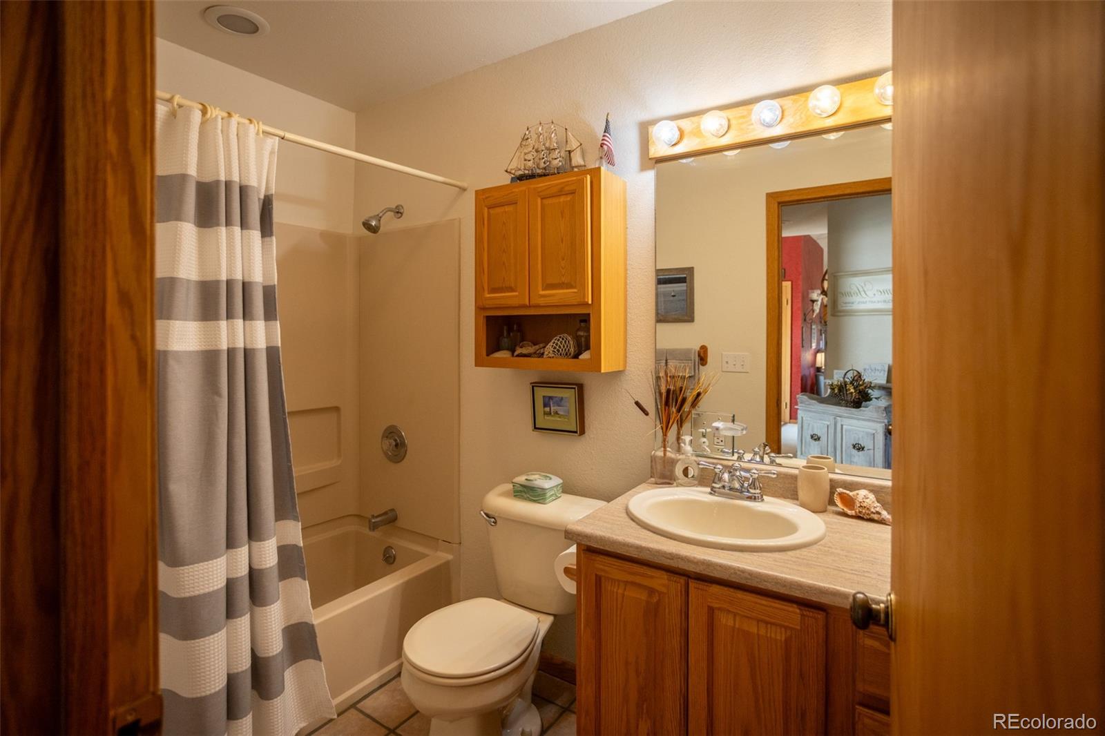 7280 County Road 178 Salida, CO 81201 - Photo 35 of 39 a bathroom with a sink toilet and shower