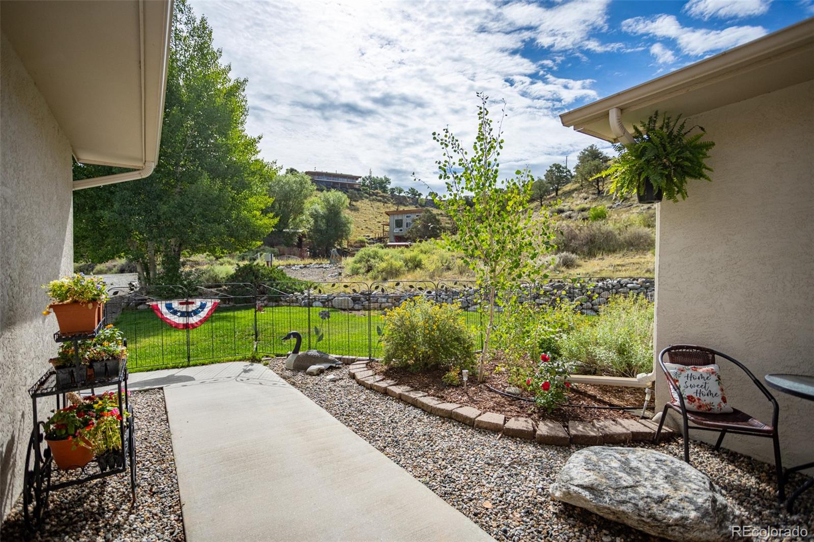 7280 County Road 178 Salida, CO 81201 - Photo 7 of 39 a view of a backyard with furniture and a garden