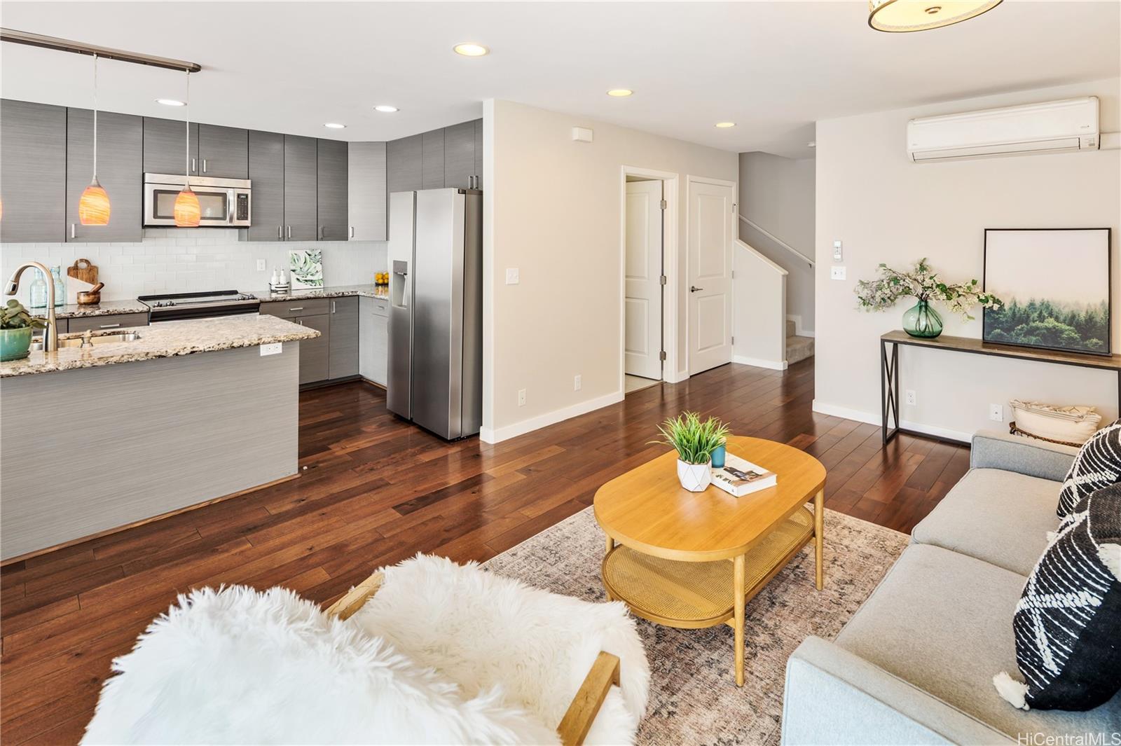 751 Kinalau Place Honolulu, HI 96813 - Photo 2 of 25 Features include recessed lighting, split AC, a brand-new refrigerator, and a convenient half bath on the ground floor.