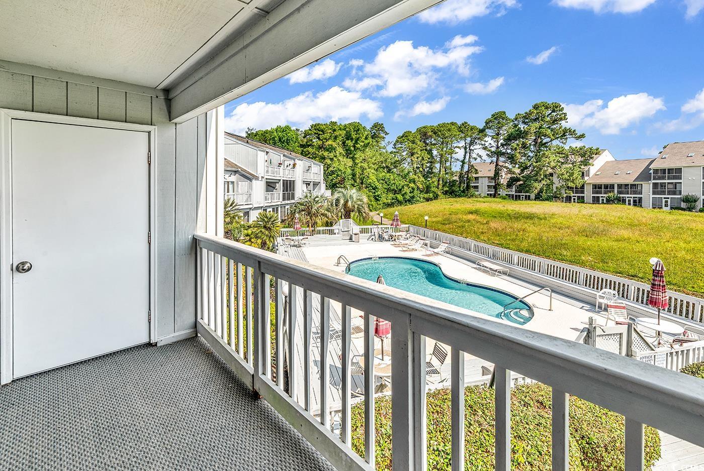 3700 Golf Colony Lane, Unit 25G Little River, SC 29566 - Photo 15 of 18 Balcony with view of pool area