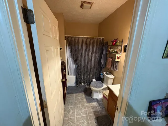 a bathroom with a sink and toilet