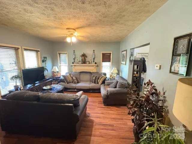 a living room with furniture or couch and a window