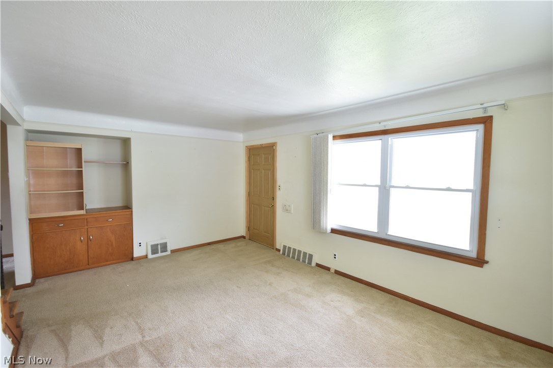 31921 Pendley Road Willowick, OH 44095 - Photo 2 of 22 Unfurnished room featuring light colored carpet
