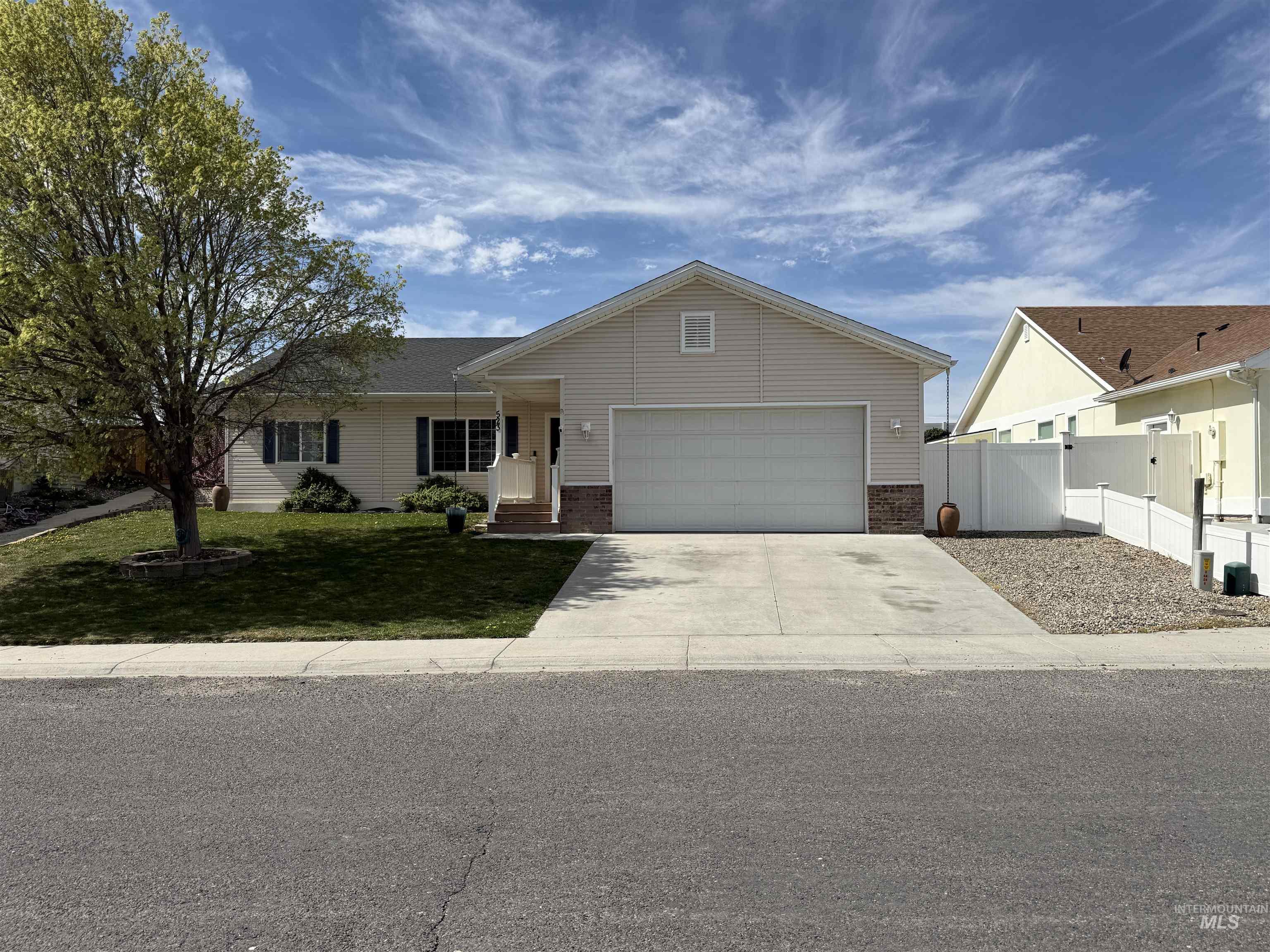 523 Morning Dove Way Marsing, ID 83639 - Photo 1 of 23 Ranch-style home with driveway, brick siding, and a garage