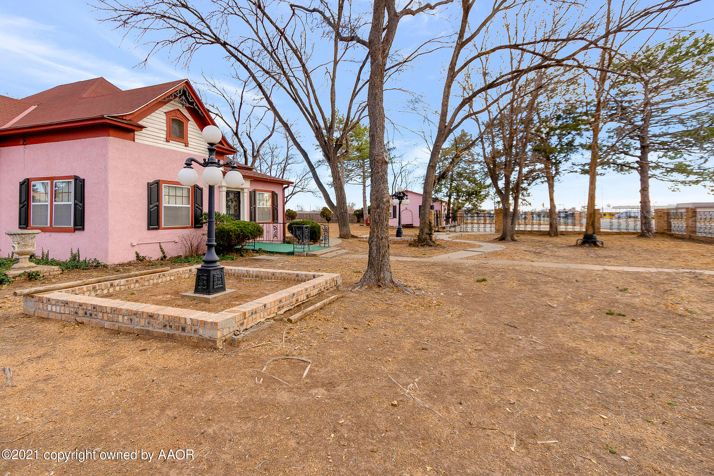 2501 South Grand Street Amarillo, TX 79103 - Photo 12 of 80 a front view of a house with a yard
