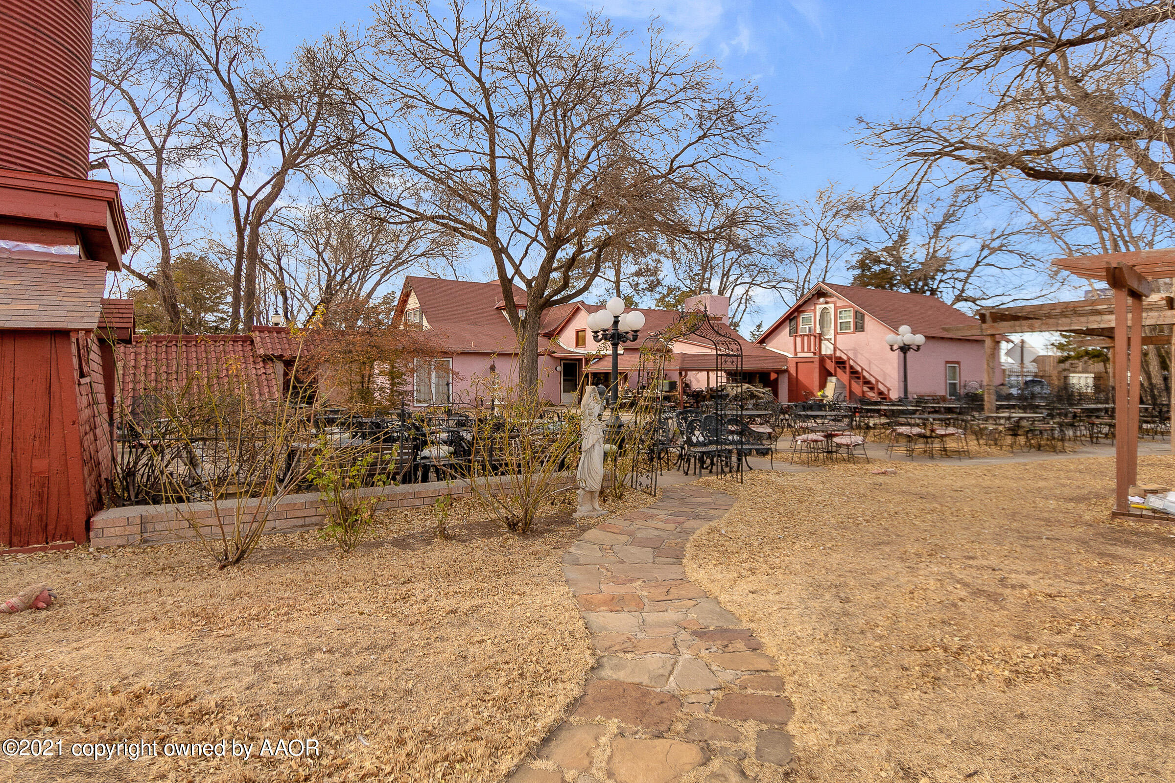 2501 South Grand Street Amarillo, TX 79103 - Photo 22 of 80 a view of swimming pool with a yard covered in snow