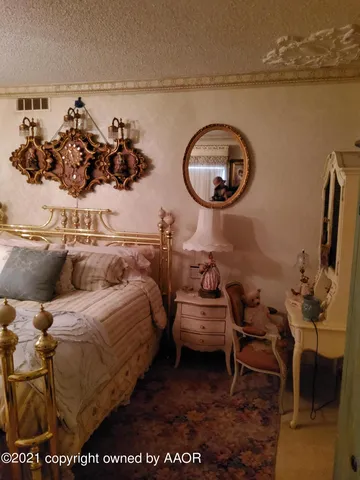 a living room with fireplace furniture and a flat screen tv