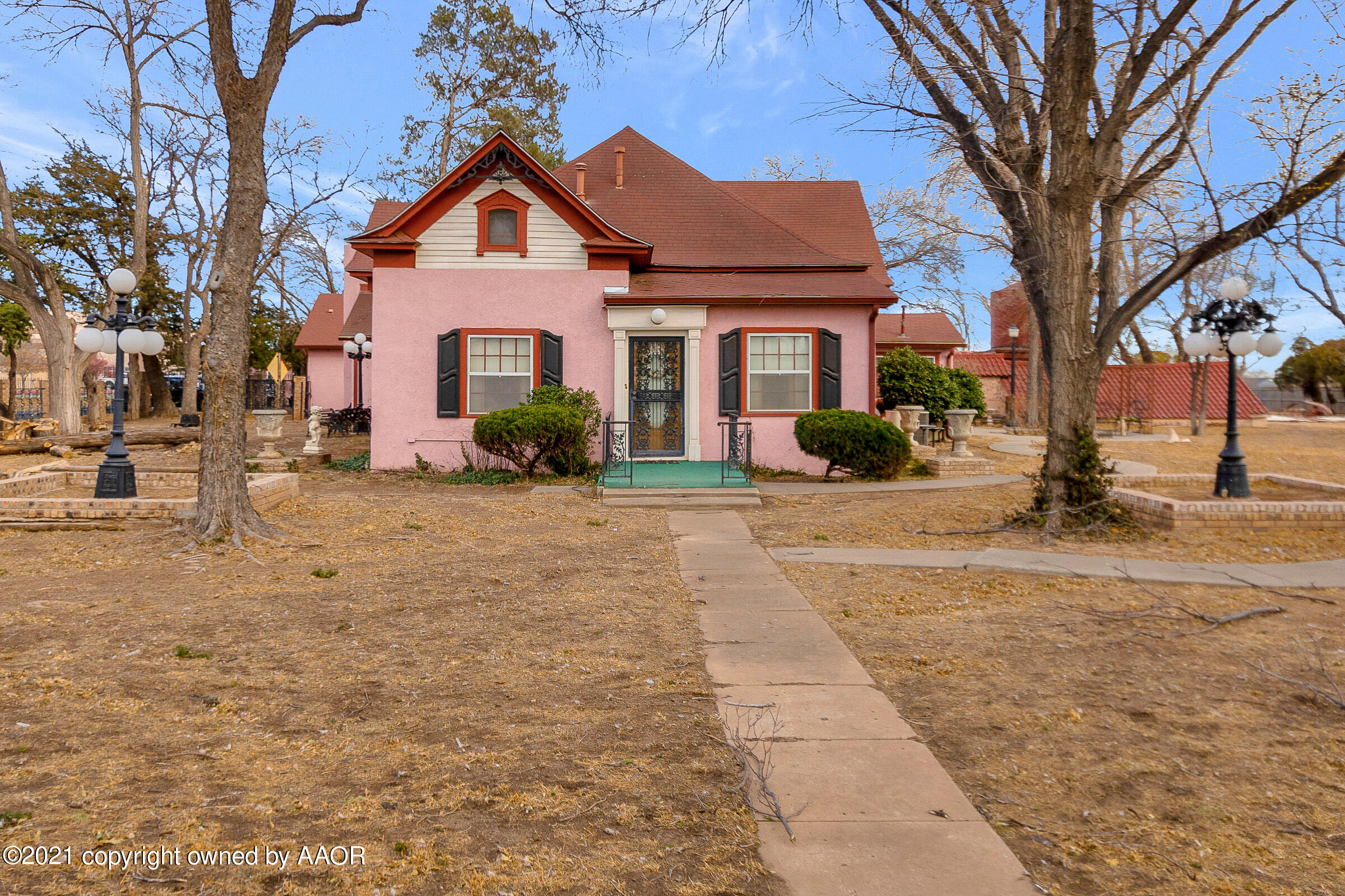 2501 South Grand Street Amarillo, TX 79103 - Photo 5 of 80 a front view of a house with a yard