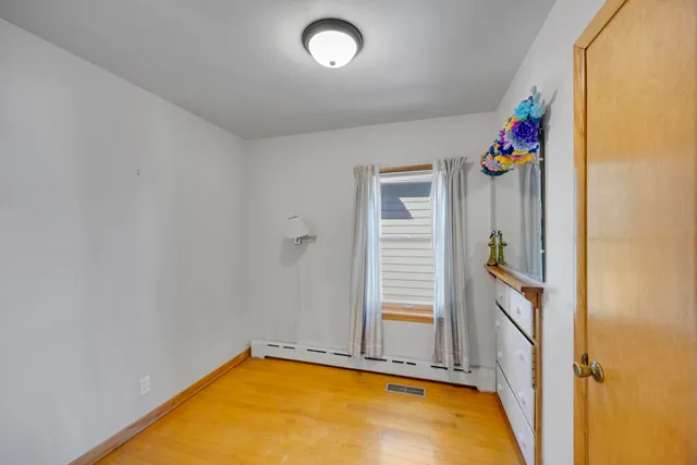 a view of a room with a window