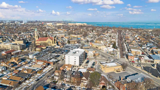 an aerial view of residential building with parking space