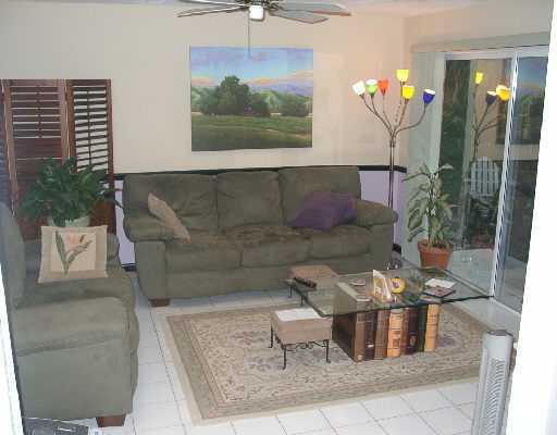 124 Northwest 10th Street Boca Raton, FL 33432 - Photo 9 of 16 a living room filled with furniture
