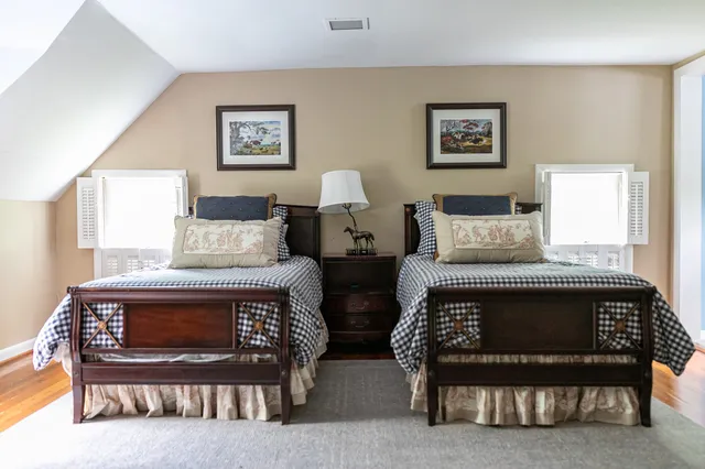 a view of a lake in middle of forest