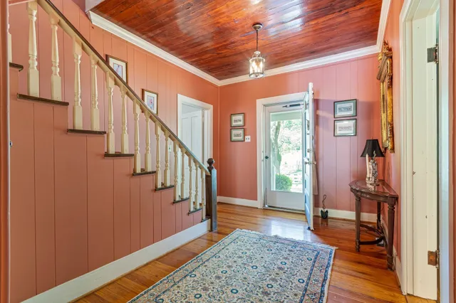 a bedroom with a bed and a fireplace