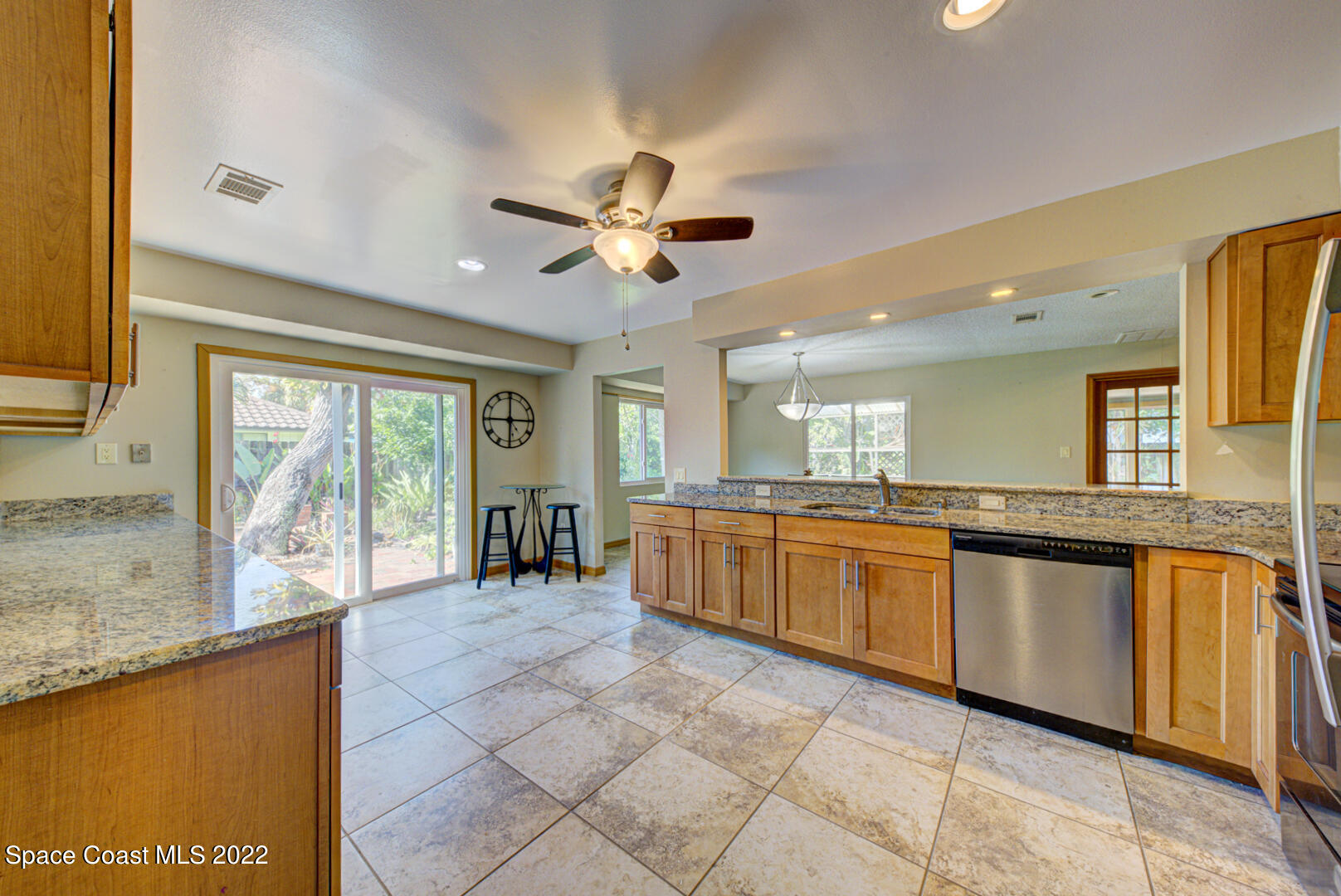 3082 Rio Pino North Indialantic, FL 32903 - Photo 8 of 37 kitchen with sliders to patio