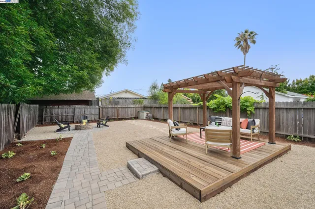 a view of a backyard with a patio