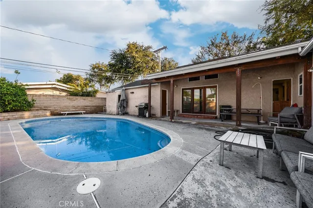 a view of outdoor space yard swimming pool and patio