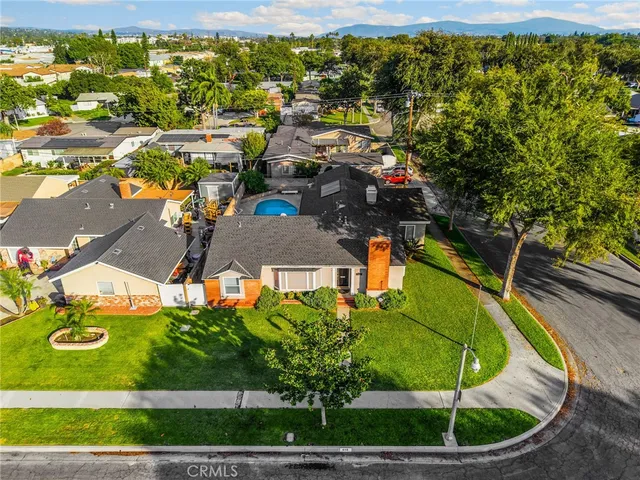 a view of a houses with a swimming pool