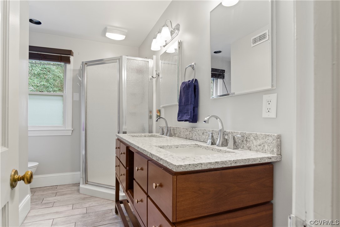 103 Overlook Drive Williamsburg, VA 23185 - Photo 25 of 50 a bathroom with a sink and a mirror