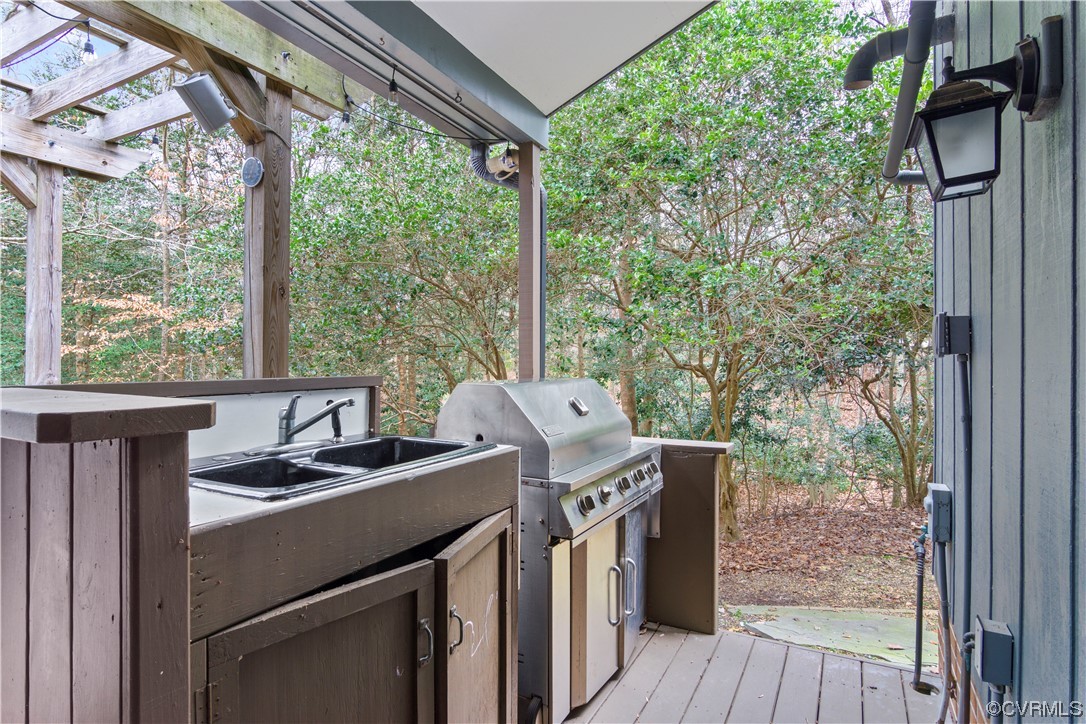 103 Overlook Drive Williamsburg, VA 23185 - Photo 41 of 50 a view of a balcony with furniture and wooden floor