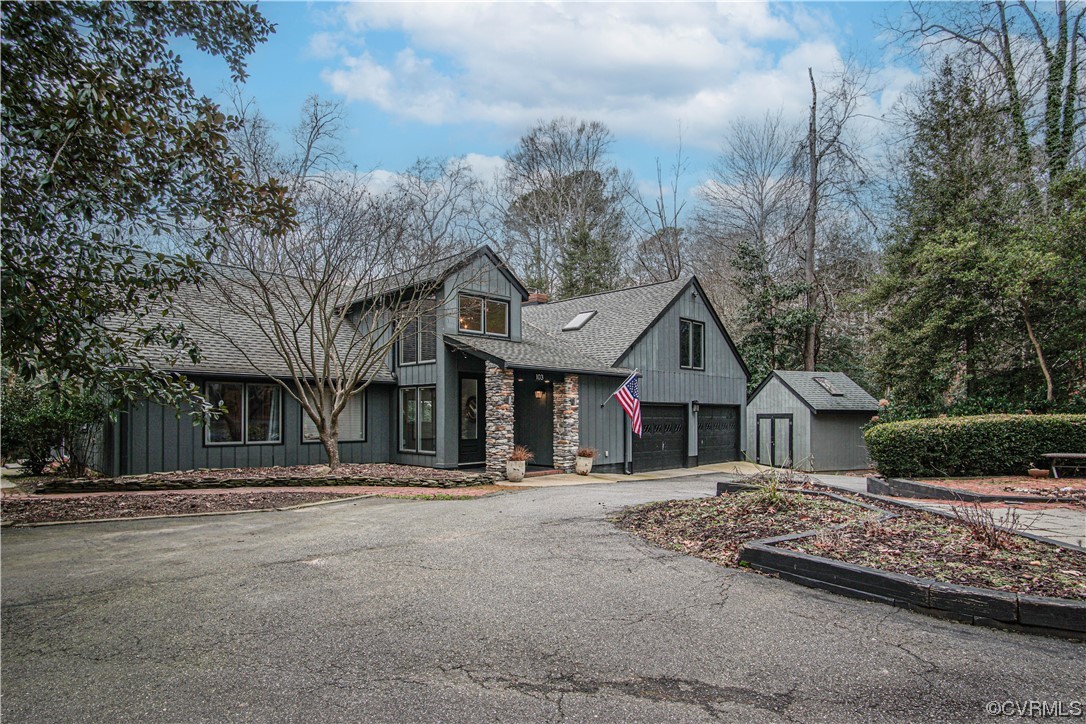103 Overlook Drive Williamsburg, VA 23185 - Photo 42 of 50 a front view of a building with large trees