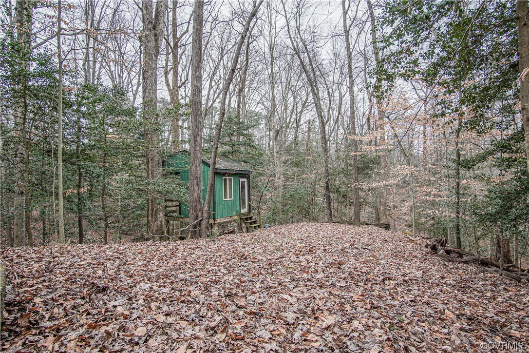 103 Overlook Drive Williamsburg, VA 23185 - Photo 46 of 50 a front view of a house with a yard