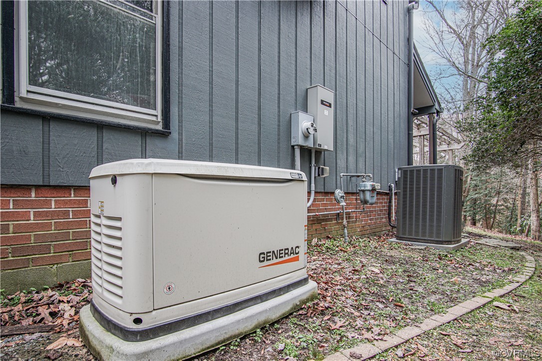 103 Overlook Drive Williamsburg, VA 23185 - Photo 47 of 50 a utility room with dryer and washer