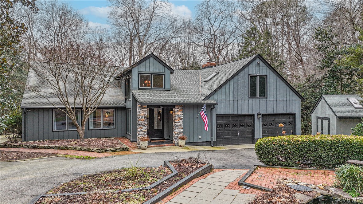 103 Overlook Drive Williamsburg, VA 23185 - Photo 48 of 50 a front view of a house with a yard and garage