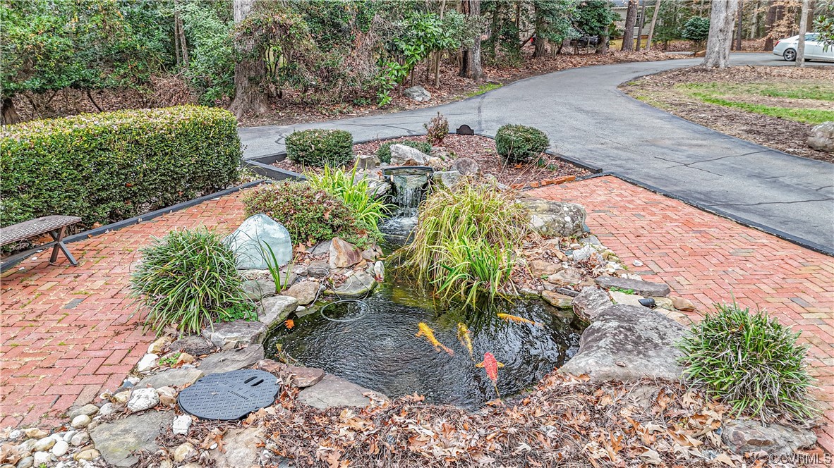 103 Overlook Drive Williamsburg, VA 23185 - Photo 7 of 50 a view of a garden with plants