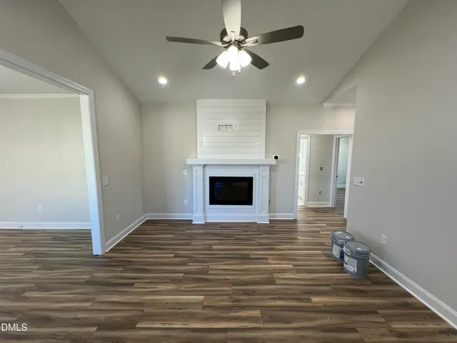 a kitchen with stainless steel appliances granite countertop a sink window and a granite counter top