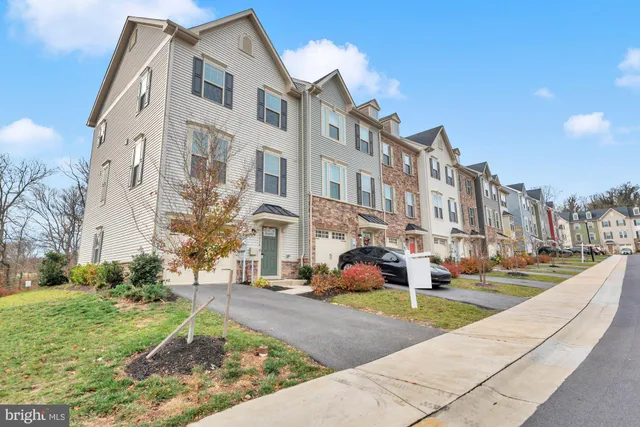 a view of a building with a yard