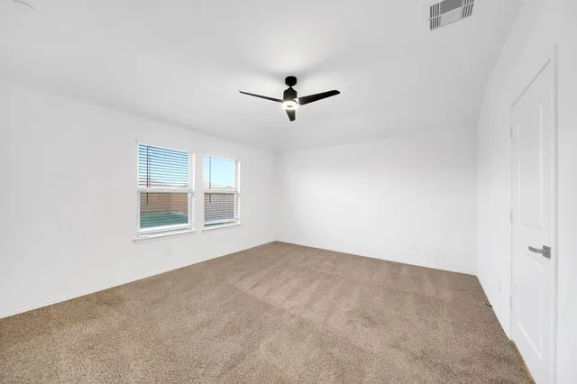 a bathroom with a sink double vanity and a mirror