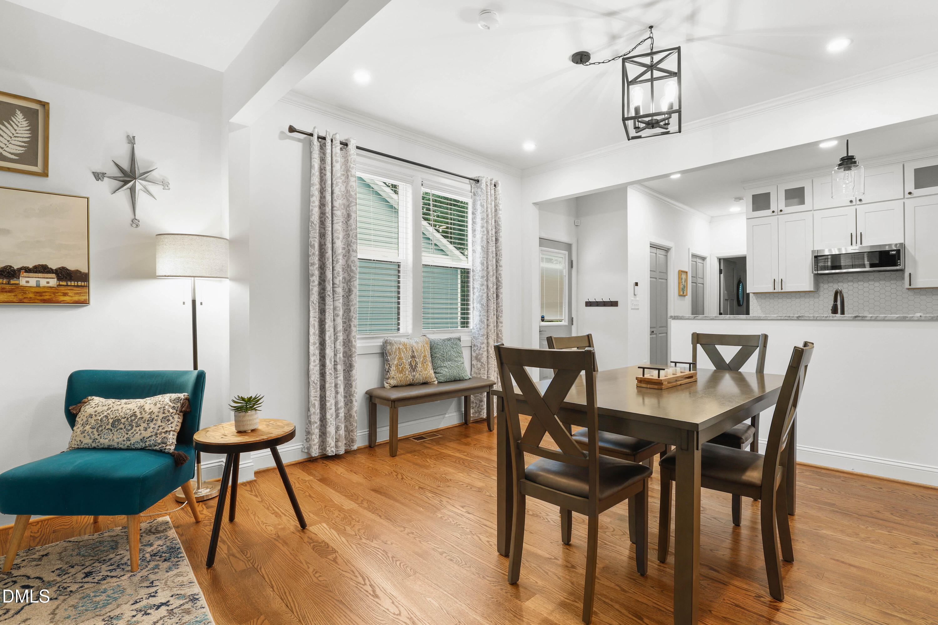 1217 Rosedale Avenue, Unit B Durham, NC 27707 - Photo 7 of 24 a view of a dining room with furniture and wooden floor