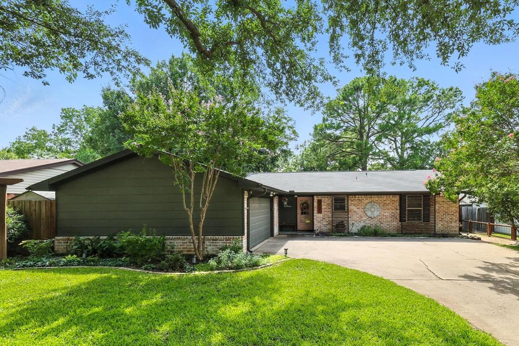 1601 Cimarron Trail Grapevine, TX 76051 - Photo 1 of 1 a view of a house with a yard