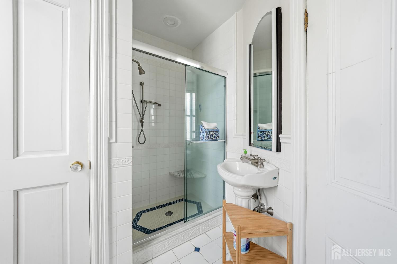 346 East Union Street Burlington, NJ 08016 - Photo 29 of 48 a bathroom with a sink mirror and toilet