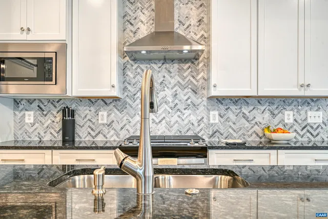 a view of a living room and hardwood floor