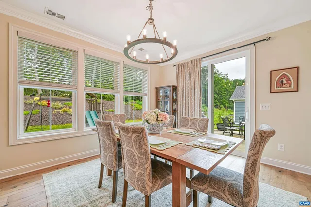 a bedroom with a bed and a dresser in it