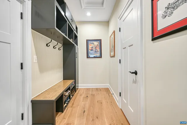 a bedroom with a bed dresser and a window