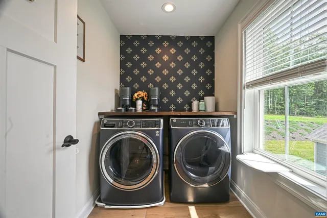 an aerial view of house with yard