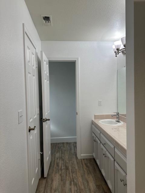 35312 George Smith Road Squaw Valley, CA 93675 - Photo 34 of 39 a bathroom with a sink and a mirror