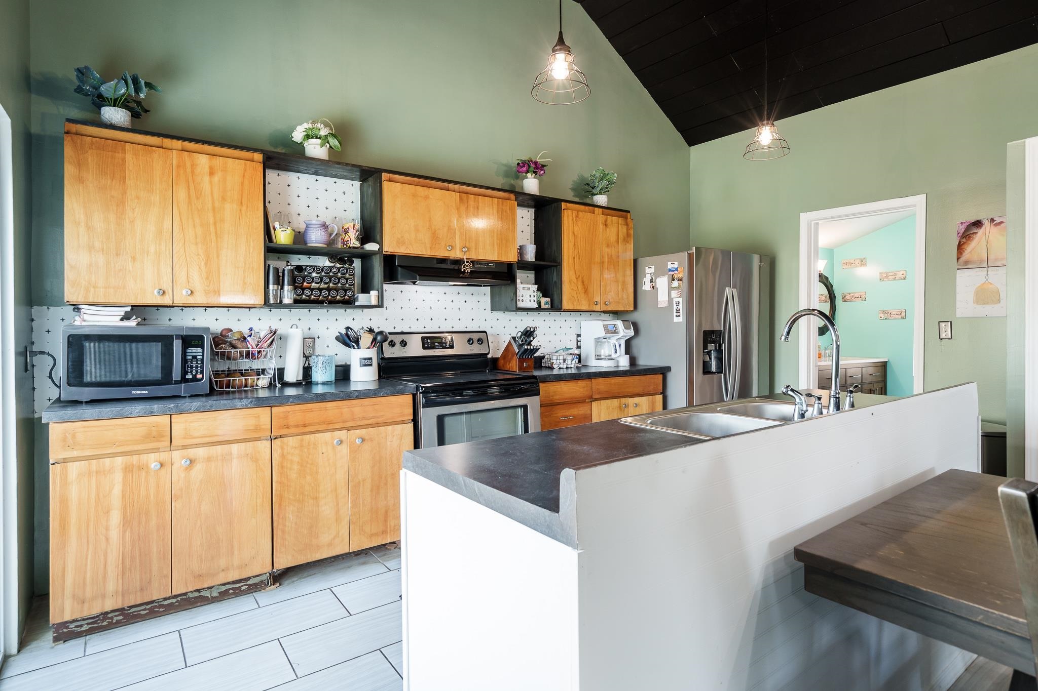 3021 North Dakota Road Freeport, IL 61032 - Photo 14 of 44 a kitchen with stainless steel appliances granite countertop a stove a sink and a refrigerator
